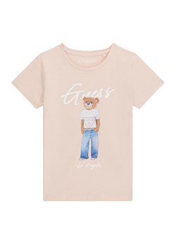 Guess T-Shirt J6GI04 K6YW4 Różowy Regular Fit ze sklepu MODIVO w kategorii Bluzki dziewczęce - zdjęcie 189135701