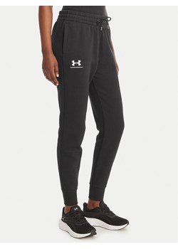 Under Armour Spodnie dresowe UA Icon Fleece 6001537 Czarny Slim Fit ze sklepu MODIVO w kategorii Spodnie damskie - zdjęcie 189147420