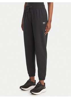 Under Armour Spodnie dresowe Sport Terry 6011020 Czarny Regular Fit ze sklepu MODIVO w kategorii Spodnie damskie - zdjęcie 189147422