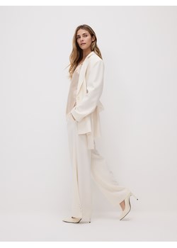 Reserved - Spodnie z wiskozą - złamana biel ze sklepu Reserved w kategorii Spodnie damskie - zdjęcie 189176013