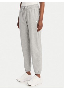 Under Armour Spodnie dresowe Sport Terry 6011020 Szary Regular Fit ze sklepu MODIVO w kategorii Spodnie damskie - zdjęcie 189181600