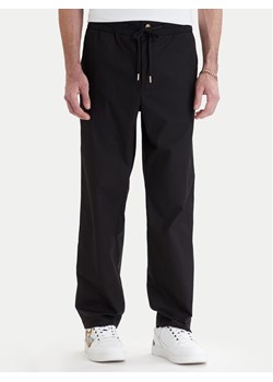 Versace Jeans Couture Spodnie materiałowe 80GAA100 N0132 Czarny Regular Fit ze sklepu MODIVO w kategorii Spodnie męskie - zdjęcie 189218620