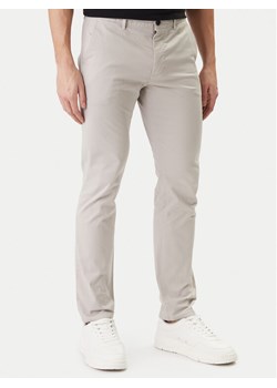BOSS Chinosy 50510933 Beżowy Slim Fit ze sklepu MODIVO w kategorii Spodnie męskie - zdjęcie 189225260
