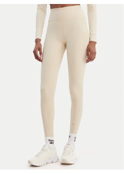 Reebok Legginsy Reebok x Ewa Chodakowska Zuzka RK25619CCW Beżowy Slim Fit ze sklepu MODIVO w kategorii Spodnie damskie - zdjęcie 189231164