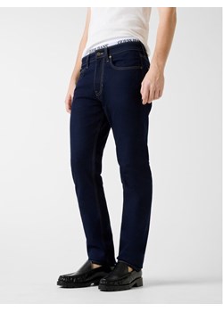 Guess Jeans Jeansy 180473 Niebieski Slim Fit ze sklepu MODIVO w kategorii Jeansy męskie - zdjęcie 189231243