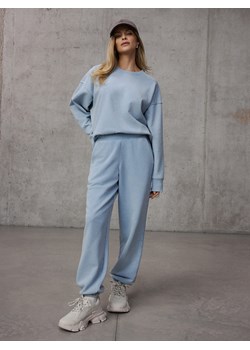 Mohito - Błękitne spodnie dresowe - błękitny ze sklepu Mohito w kategorii Spodnie damskie - zdjęcie 189245074