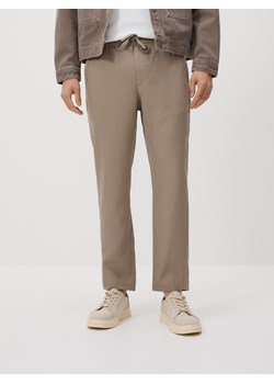 Reserved - Spodnie z lyocellu - brązowy ze sklepu Reserved w kategorii Spodnie męskie - zdjęcie 189245560