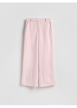 Reserved - Szerokie spodnie - pastelowy róż ze sklepu Reserved w kategorii Spodnie damskie - zdjęcie 189255400