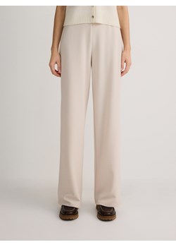 Reserved - Spodnie z szerokimi nogawkami - beżowy ze sklepu Reserved w kategorii Spodnie damskie - zdjęcie 189259322