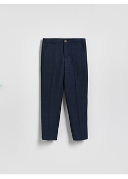 Reserved - Eleganckie spodnie w kratę - granatowy ze sklepu Reserved w kategorii Spodnie chłopięce - zdjęcie 189262214