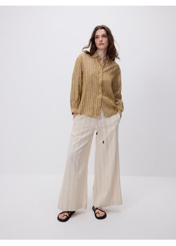 Reserved - Luźne spodnie z domieszką lnu - kremowy ze sklepu Reserved w kategorii Spodnie damskie - zdjęcie 189262944
