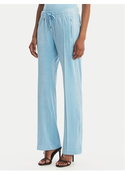 Juicy Couture Spodnie dresowe Tina JCWBJ126327 Błękitny Straight Leg ze sklepu MODIVO w kategorii Spodnie damskie - zdjęcie 189266963