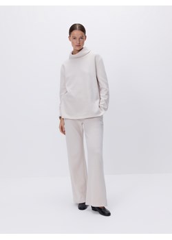 Reserved - Dzianinowe spodnie z bawełną - beżowy ze sklepu Reserved w kategorii Spodnie damskie - zdjęcie 189270112