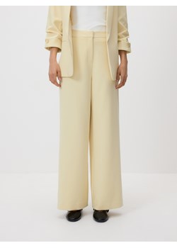 Reserved - Spodnie z szerokimi nogawkami - jasnożółty ze sklepu Reserved w kategorii Spodnie damskie - zdjęcie 189274902