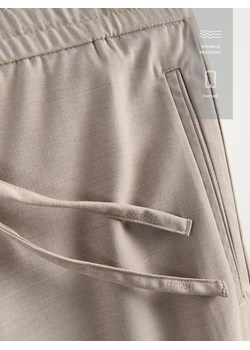 Reserved - Spodnie joggery - beżowy ze sklepu Reserved w kategorii Spodnie męskie - zdjęcie 189286712