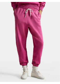 Polo Ralph Lauren Spodnie dresowe 211971700501 Różowy Tapered Fit ze sklepu MODIVO w kategorii Spodnie damskie - zdjęcie 189318471