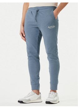 Jack & Jones Spodnie dresowe Gordon 12288641 Granatowy Regular Fit ze sklepu MODIVO w kategorii Spodnie męskie - zdjęcie 189322740