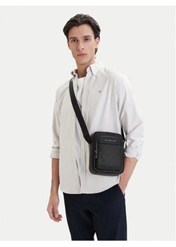 Tommy Hilfiger Saszetka Th Flag Monogram Mini Reporter AM0AM14138 Czarny ze sklepu MODIVO w kategorii Torby męskie - zdjęcie 189322820