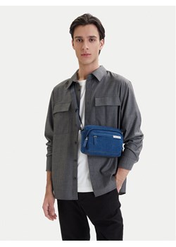 Calvin Klein Saszetka Sleek Denim Utility Camera Bag LV04D3432G Niebieski ze sklepu MODIVO w kategorii Torby męskie - zdjęcie 189322851