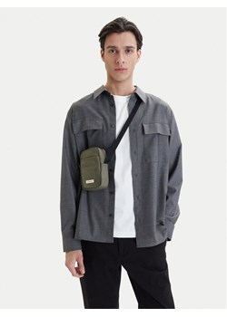 Calvin Klein Saszetka Sleek Slim Reporter LV04D3233G Zielony ze sklepu MODIVO w kategorii Torby męskie - zdjęcie 189322901