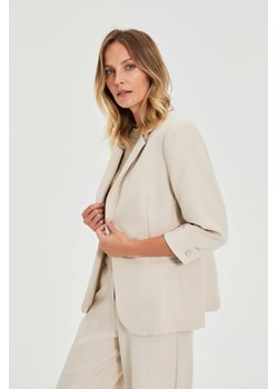 Marynarka z rękawami 3/4 beżowa ze sklepu Moodo.pl w kategorii Marynarki damskie - zdjęcie 189324271