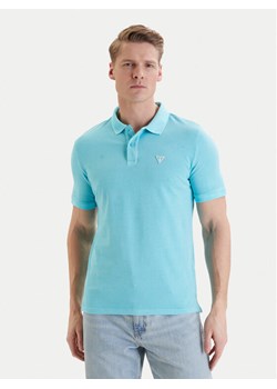 Guess Polo F6GP03 K9WF1 Turkusowy Slim Fit ze sklepu MODIVO w kategorii T-shirty męskie - zdjęcie 189340054