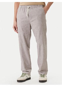 Tommy Jeans Spodnie materiałowe Sonny DM0DM22820 Beżowy Slim Fit ze sklepu MODIVO w kategorii Spodnie męskie - zdjęcie 189370734