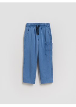 Reserved - Dresowe spodnie oversize - niebieski ze sklepu Reserved w kategorii Spodnie chłopięce - zdjęcie 189374070
