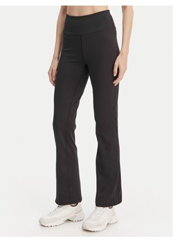 Calvin Klein Performance Legginsy Icon LVGWS6L648 Czarny Flare Fit ze sklepu MODIVO w kategorii Spodnie damskie - zdjęcie 189387441