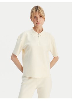 Calvin Klein Polo LV044E241G Beżowy Relaxed Fit ze sklepu MODIVO w kategorii Bluzki damskie - zdjęcie 189387473