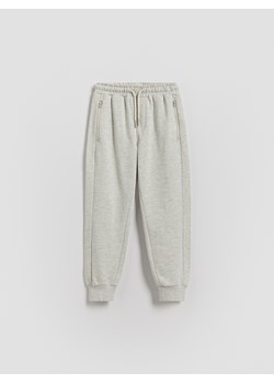 Reserved - Bawełniane joggery - beżowy ze sklepu Reserved w kategorii Spodnie chłopięce - zdjęcie 189406984